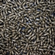 Top Down View Of Pile Of Aerospace Hardware Spring Screws