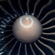 High Angle Close Up Of Commercial Aircraft Engine Turbine Fan Blades